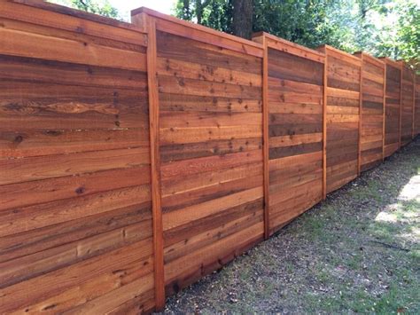 8h Horizontal Cedar Privacy Fence Wcap And Trim Stained Traditional