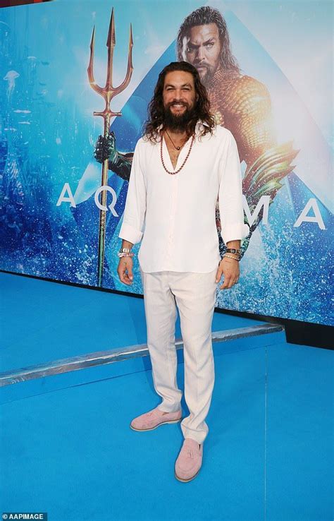 Man Of Action Dressed In All White The Long Haired Actor Looked Typically Bohemian In An