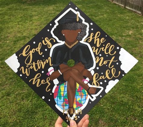African American Woman Sitting On World With Degrees Graduation Cap