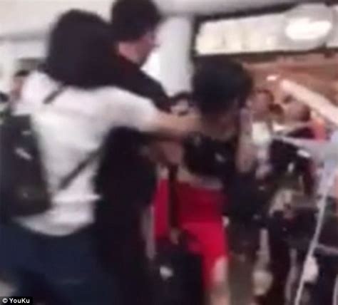 Chinese Wife Beats And Strips Her Husband S Mistress In Airport Brawl Daily Mail Online