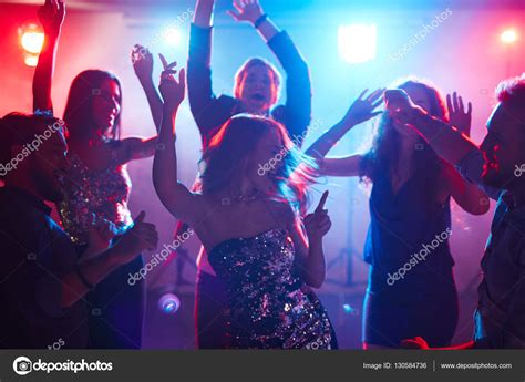 Friends Enjoying Party With Dancing — Stock Photo © Pressmaster 130584736
