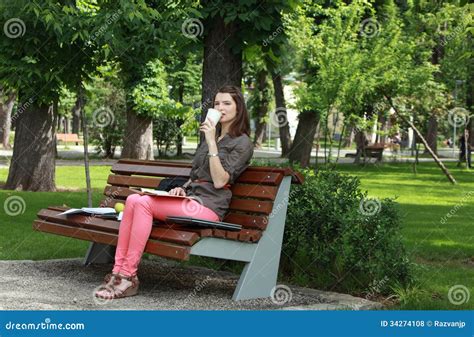 Woman Drinking Coffee In A Park Stock Photo Image Of Computer Nature