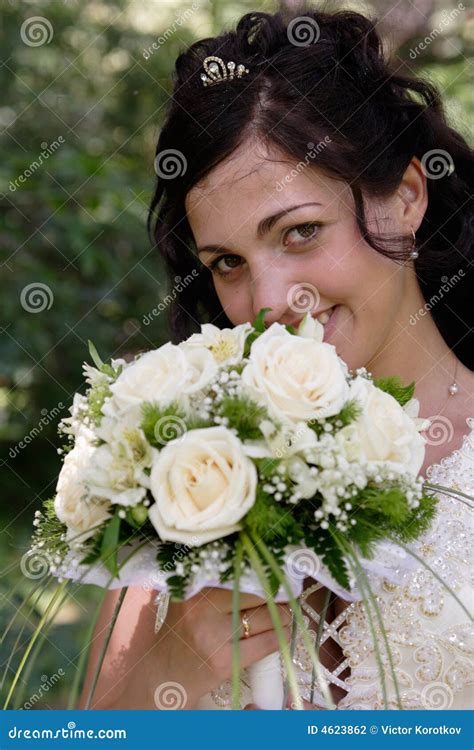 Bride With A Bunch Of Flowers Stock Photo Image Of Bride Smiling