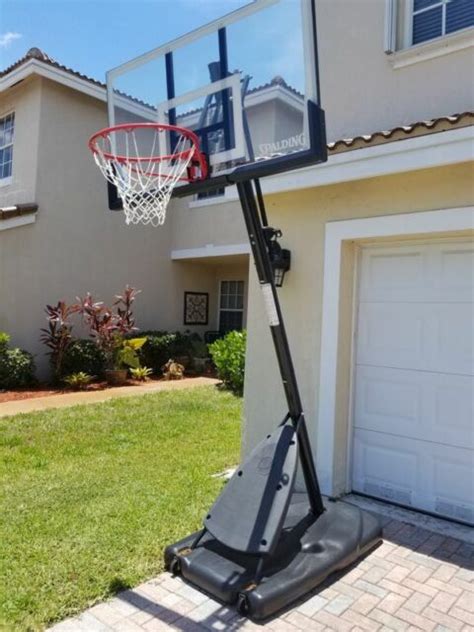 Spalding 54 Portable Basketball System Adjustable Hoop Backboard