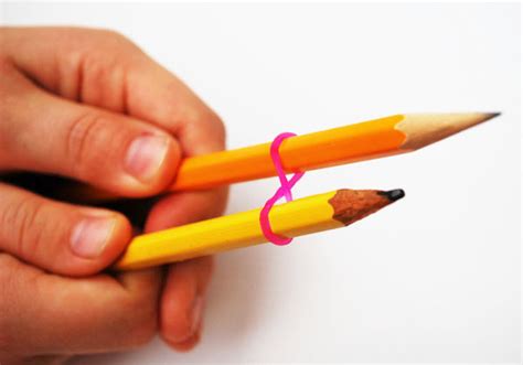 Add more diversity to your daily styling routine with rubber bands! Make Rainbow Loom Bracelets Using Two Pencils ...