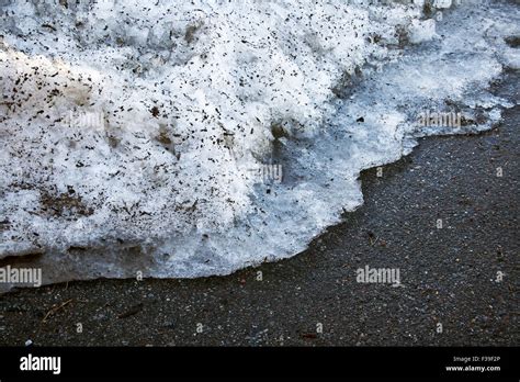 Melting Snow On The Road Stock Photo Alamy