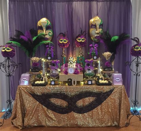 birthday masquerade party candy buffet in purple green black and gold mardi gras party