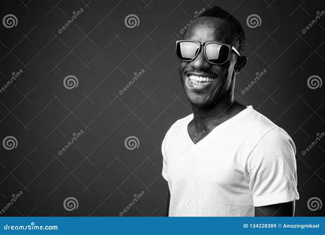 Young African Man Wearing Sunglasses And Smiling Stock Image Image Of