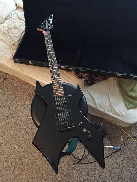 80s era bc rich warlock platinum with floyd rose not the best guitar in the world but ive