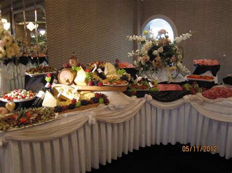 Table Set Up Of The Ornate Food Displays At Celebrations Buffet Set Up
