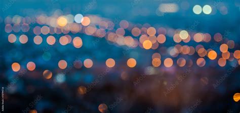 City Blurring Lights Abstract Circular Bokeh On Blue Background Stock