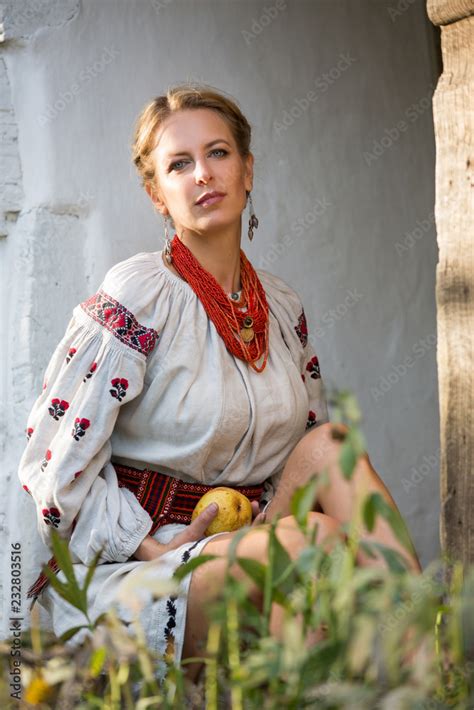 foto de ukrainian girl in embroidered dress in the village portrait of slavonic woman in