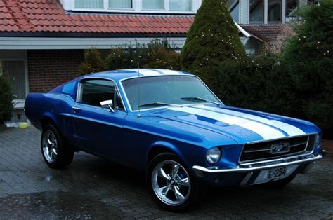 Blue Mustang With Racing Stripes