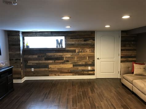 Pallet Wood Accent Wall With Baseboard In Basement Mancave Bars