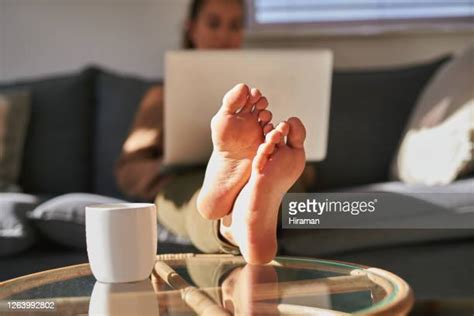 Feet In Lap Photos And Premium High Res Pictures Getty Images