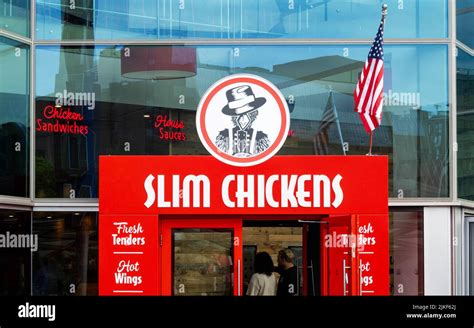 Sign Above The Entrance To Slim Chickens An American Fast Food