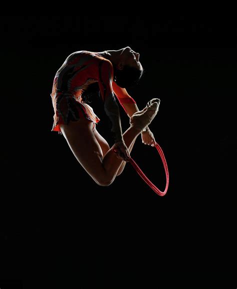 Rhythmic Gymnast Leaping In The Air Photograph By International Rescue
