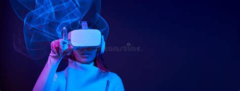 Woman Is Using Virtual Reality Headset To Access In Metaverse Stock