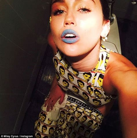 Miley Cyrus Shows Off Drake Print Outfit As She Shares Toilet Selfie