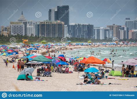 Tourists On Miami Beach Getting Ready For A Day At The Beach Editorial Stock Image Image Of