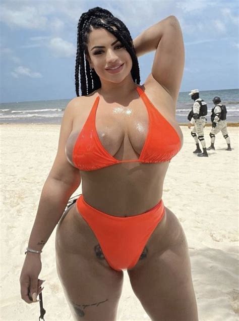 Model With Biggest Butt On Onlyfans Parades Around In Racy Orange Bikini Set Holly Tales