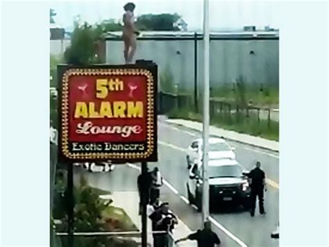 Naked Man Taunts Police From Atop Sign At Springfield Strip Club Masslive Com