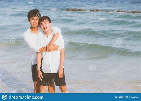 Homosexual Portrait Young Asian Couple Standing Hug Together On Beach