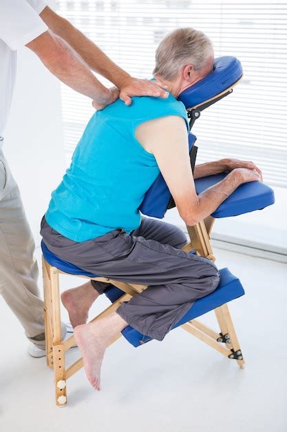 premium photo man having back massage