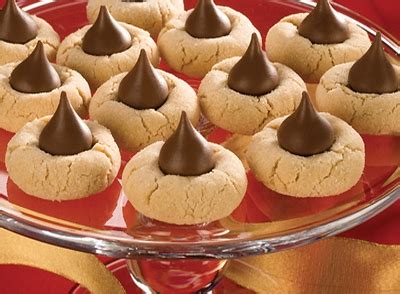 One of the best things about hershey kisses is their versatility in baking and dessert making! Adirondack Baker: Peanut Butter Blossoms by Hershey's Kisses