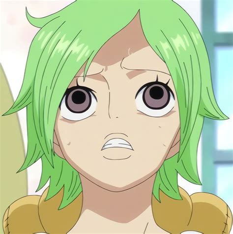 An Anime Character With Green Hair And Big Eyes
