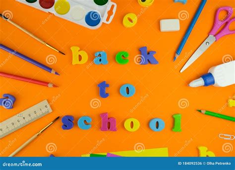 Set Of School Supplies On Orange Background Back To School Stock Photo