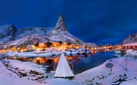 Warm Winter Houses In The Snowy Islands Of Lofoten