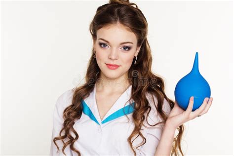 Young Pretty Girl Nurse With Blue Squirt In Hands Stock Image Image