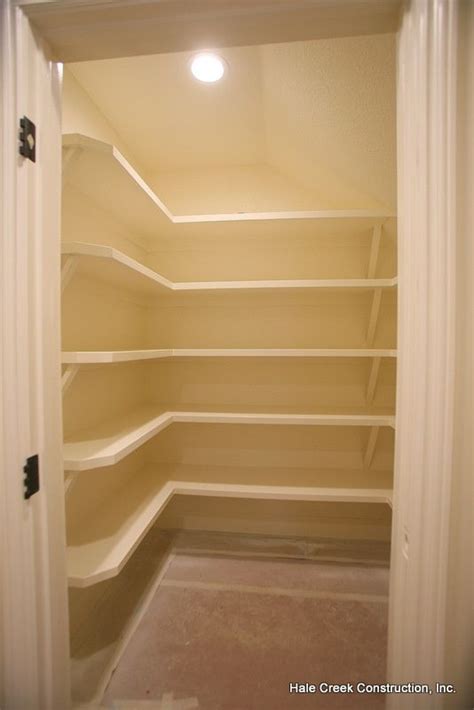John lewis of hungerford have a bespoke solution for an under stair space that's next to the dining room. under stairs closet and shelving. Could apply to my ...