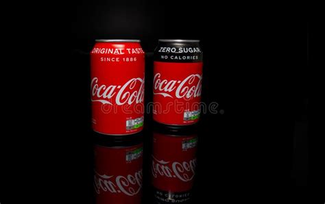 Two Coca Cola Can On Black Background Editorial Stock Image Image Of