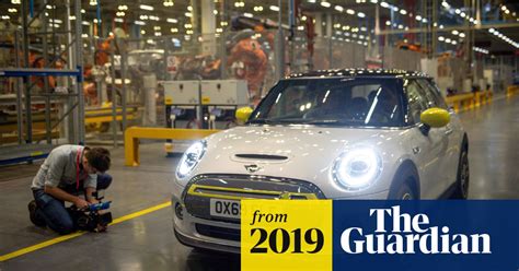 Bmw Unveils Electric Mini As It Charges Into New Era Bmw The Guardian