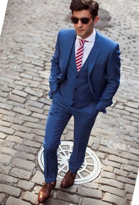 A tan suit will look dressy but not too formal and will be more comfortable in warm weather, especially. Groom Suits