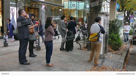 People Smoking Cigarettes In The Streets Of Tokyo Japan Asia Stock