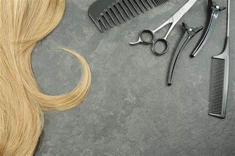 Premium Photo Blonde Curl Of Hair And Hairdresser Set Isolated On