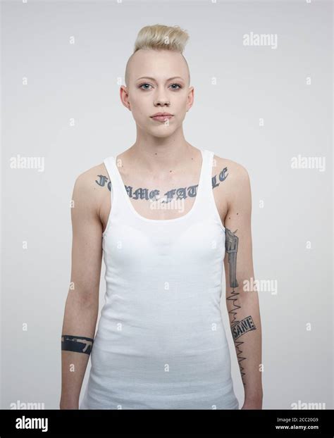 Young Woman Shaved Head Tattoos Hi Res Stock Photography And Images Alamy
