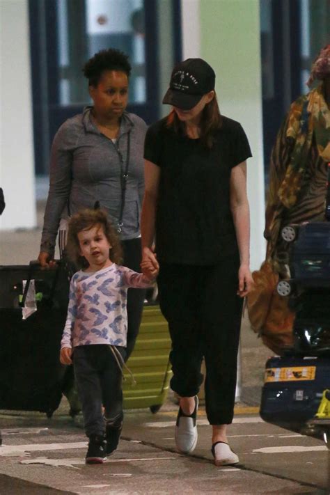 Anne Hathaway Out With Her Son Jonathan Arrives At Jfk Airport In New