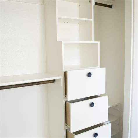 Hanging storage and more shelves are added to the left and right and can be configured for short or long hanging spaces. DIY Closet Kit for Under $50 | Hometalk