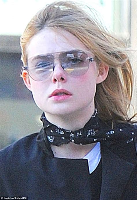 Elle Fanning Dons Oversized Tinted Glasses As She Goes For A Stroll In New York Daily Mail Online