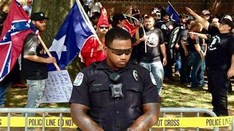 Photo Of Black Cop Protecting Racist Rally From Earlier Event The