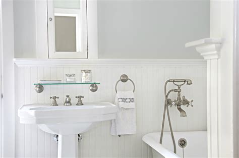 This is a simple, easy to build design made by stacking a small milled chair rail profile on top of a broader backer board. White Beadboard Bathroom - Cottage - bathroom - Titan and Co