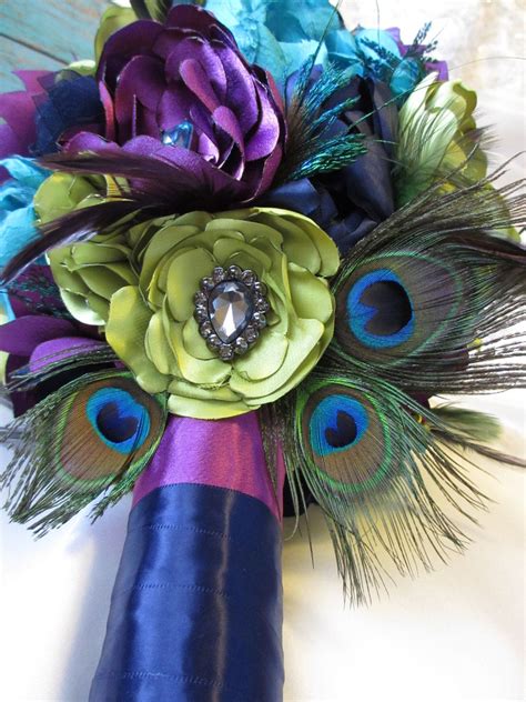 Beautiful peacock feather bouquets for peacock themed weddings. Love the colors...Beautiful Peacock Fabric Flower Wedding ...