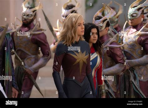 L R Brie Larson As Captain Marvelcarol Danvers And Iman Vellani As