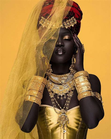 sudanese model nyakim enters guinness book of records for having the darkest skin tone on earth