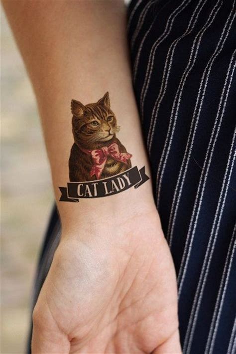 Coloured Cat Tattoo On Wrist Tattooimagesbiz