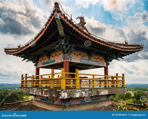 A Traditional Chinese Roofed Pavilion Pagoda On A High Mountain In